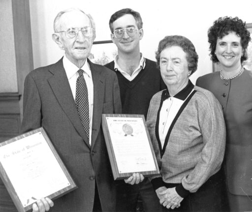 Adolph receiving an award